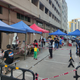 This photo taken on March 13, 2022 shows residents lining up to undergo nucleic acid tests for covid-19 in Shenzhen, in China’s southern Guangdong province.